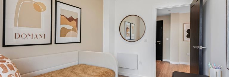 Property 3 of 5. Bedroom With Sofa Bed, Wall Hangings, Table