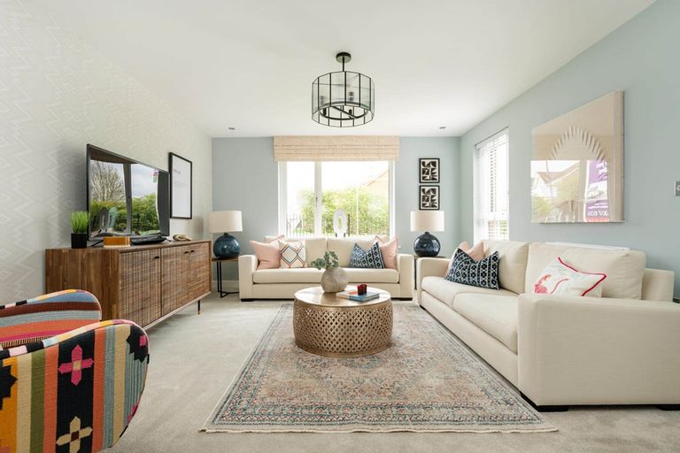 Property 2 of 12. A Bright And Airy Lounge Offers Space To Unwind With The Family