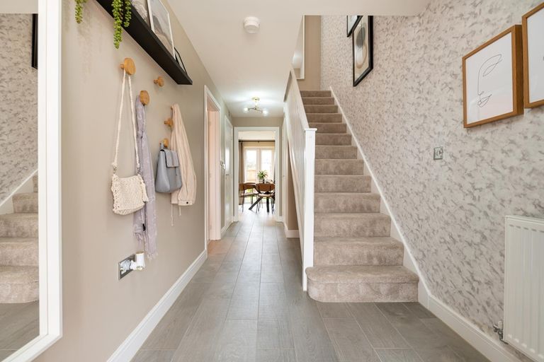 Property 1 of 10. Welcoming Entrance Hall With Under Stairs Storage