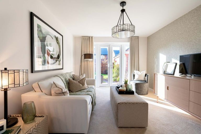 Property 3 of 12. Living Room Filled With Natural Light From French Doors To The Garden