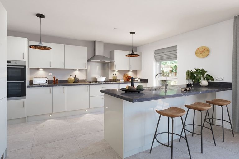 Property 2 of 13. Modern Kitchen With Ample Storage And Sociable Breakfast Bar