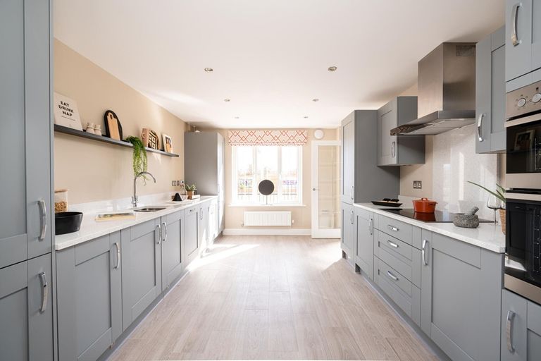 Property 1 of 13. The Modern Kitchen Offers Plenty Of Worktop And Storage Space