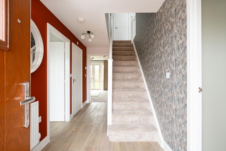 Property 3 of 12. The Marford Has A Bright And Spacious Hallway With Under Stairs Storage