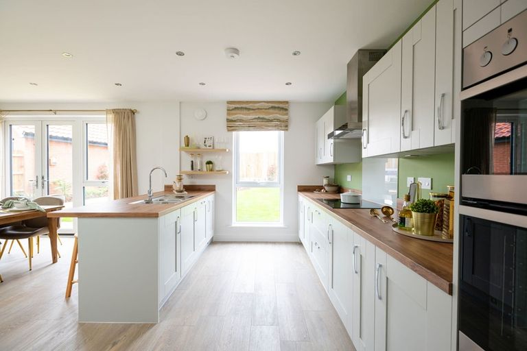 Property 3 of 13. The Modern Kitchen Is Light And Has Ample Storage And Worktop Space